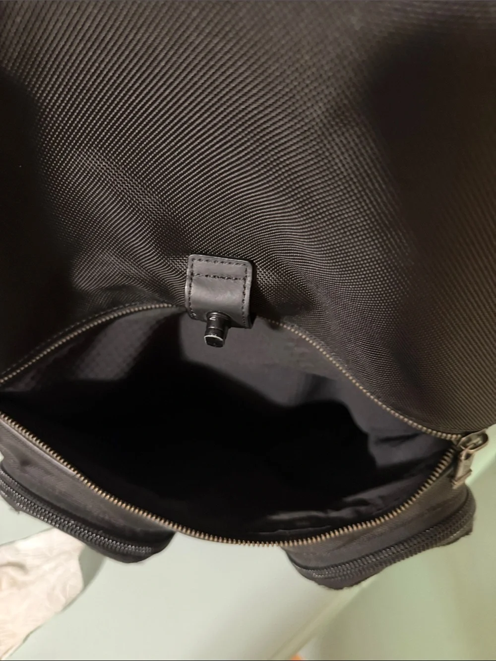 Tumi Black Roll-Top Backpack with Front Pockets